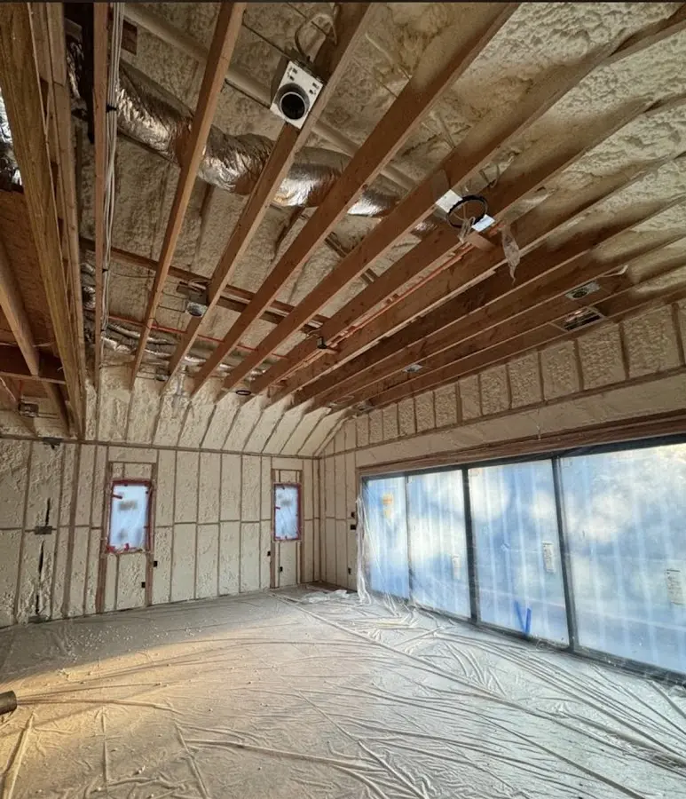 Interior walls and ceiling insulated with spray foam during new construction in Roxboro
